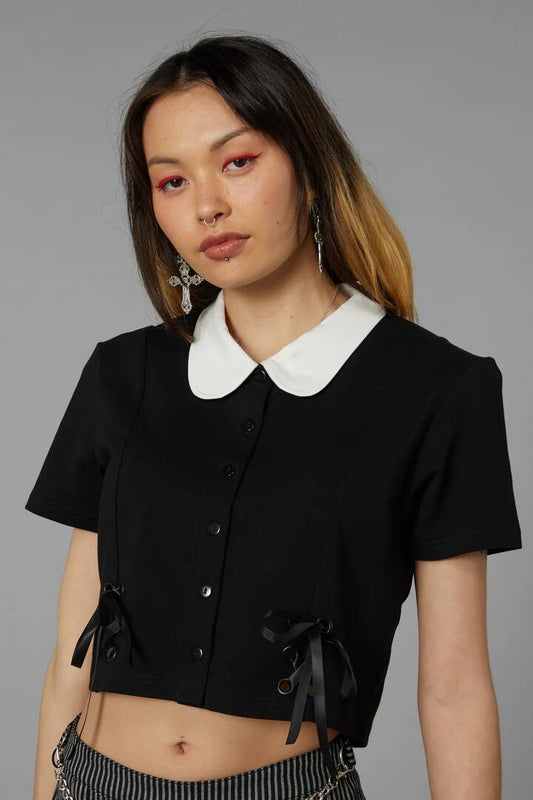 Image of a model wearing Tops. Productname: Basic Witch Top in Black colour by brand - Black Friday