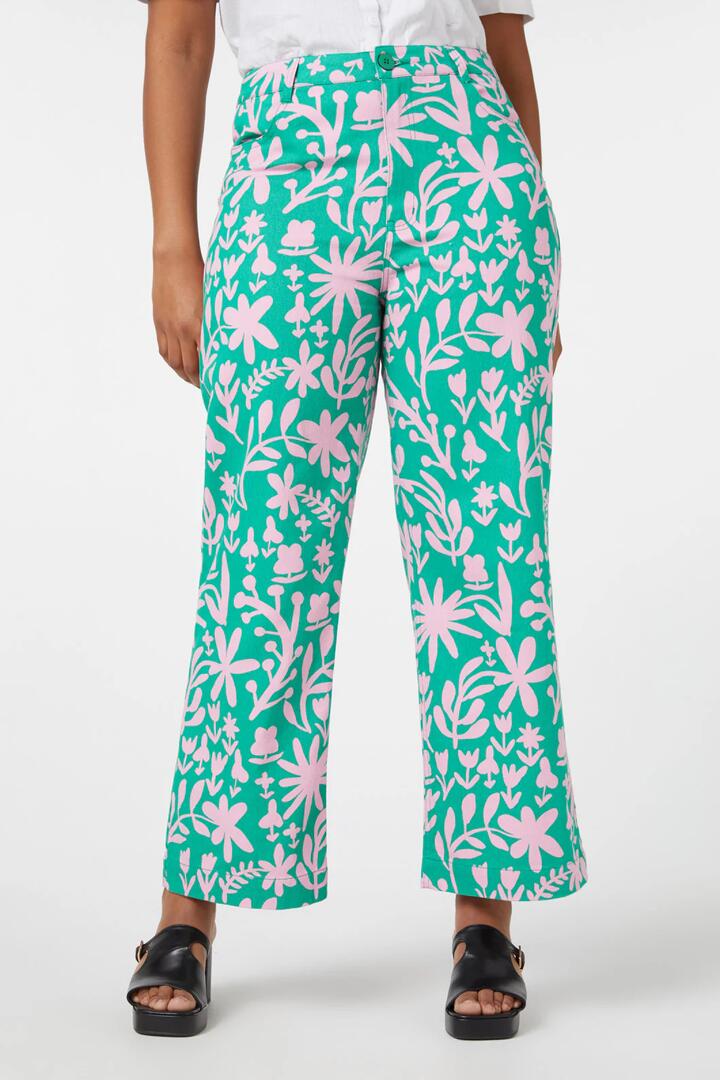 Image of a model wearing Denim. Productname: Della Floral Printed Jean in Green colour by brand - Princess Highway