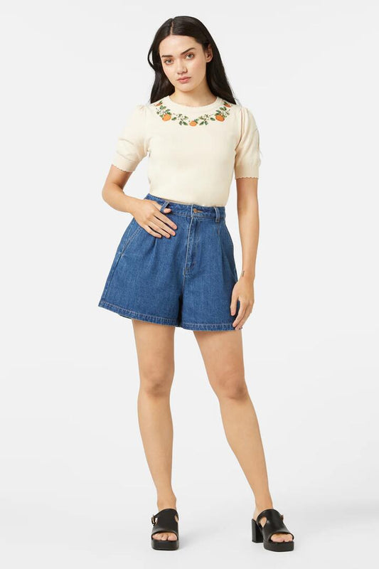 Image of a model wearing Skirts. Productname: Valerie Skort in Mid Denim colour by brand - Princess Highway