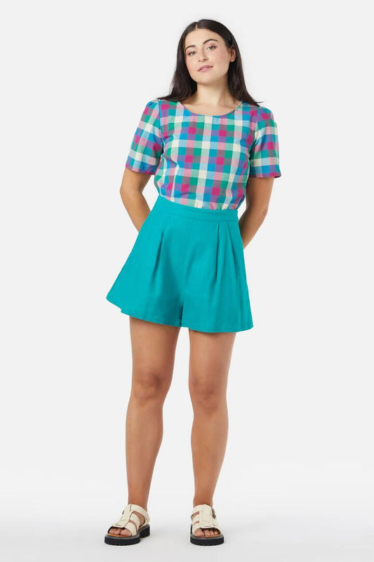 Image of a model wearing Skirts. Productname: Payton Skort in Teal colour by brand - Princess Highway