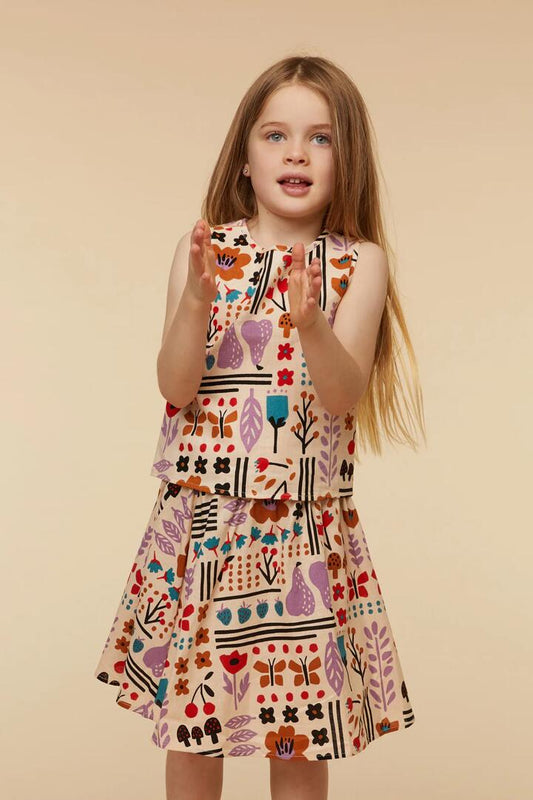Image of a model wearing Skirts. Productname: Variety Day Skirt in Cream colour by brand - Princess Highway Kids