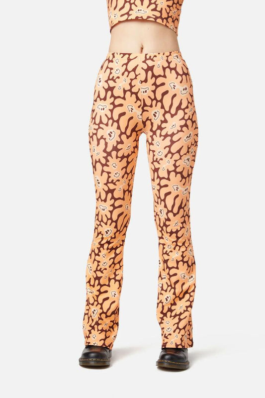 Image of a model wearing Pants. Productname: Flower Frenzy Pant in Brown colour by brand - Dangerfield