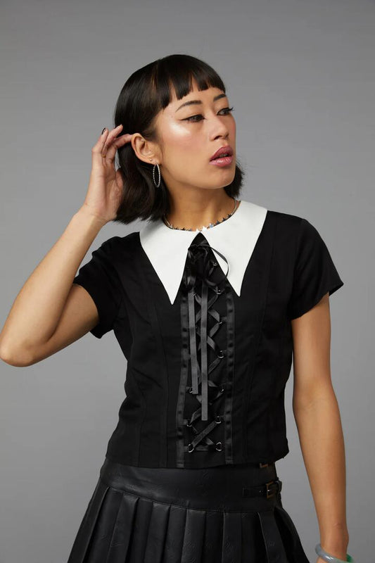 Image of a model wearing Tops. Productname: All Tied Up Gothic Blouse in Black colour by brand - Black Friday