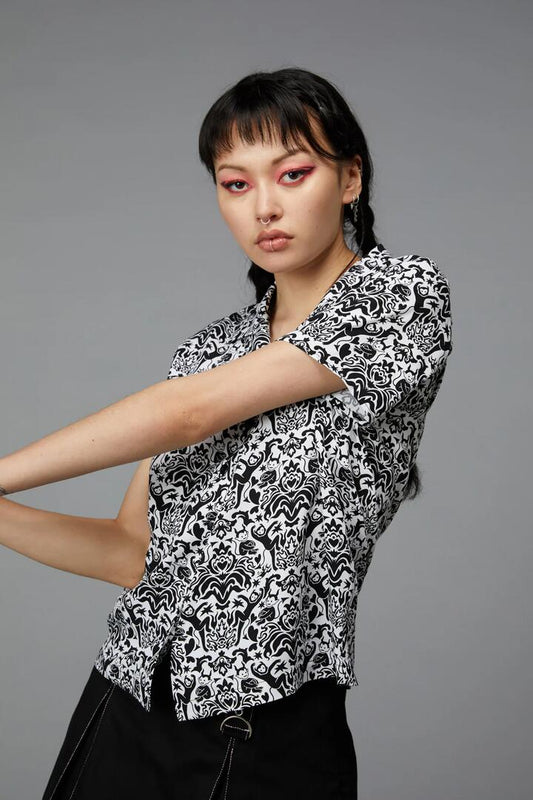 Image of a model wearing Tops. Productname: Devil Print Blouse in Black/White colour by brand - Black Friday