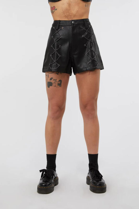Image of a model wearing Shorts. Productname: Chain Lace Up PU Short in Black colour by brand - Dangerfield