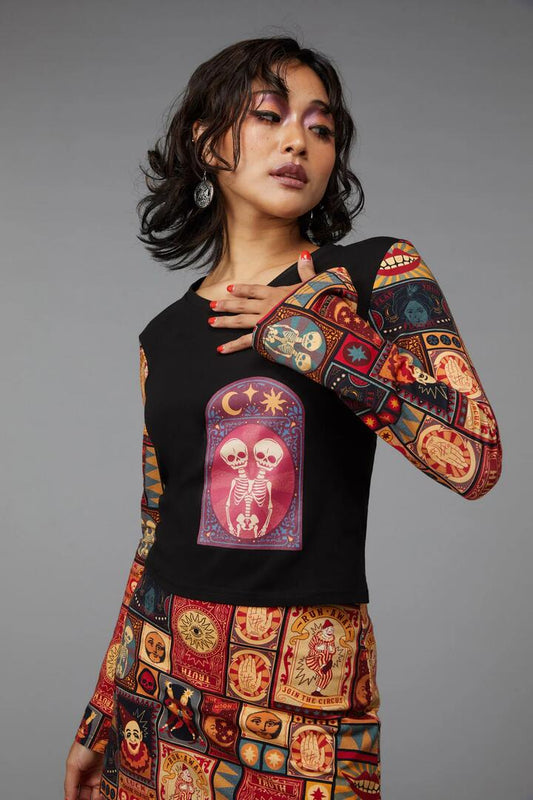Image of a model wearing Tops. Productname: Twinning Top in Multi colour by brand - Black Friday