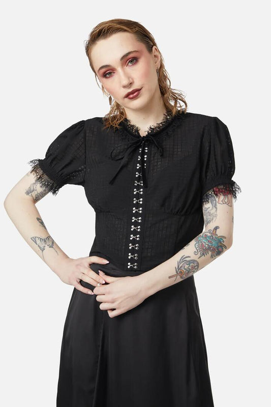 Image of a model wearing Tops. Productname: Time Passing Romantic Lace Blouse in Black colour by brand - Dangerfield