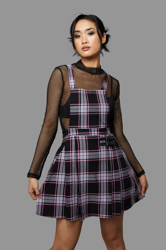 Image of a model wearing Dress. Productname: Myrtle Tartan Pinafore in Purple colour by brand - Black Friday