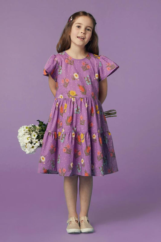 Image of a model wearing Dress. Productname: Mia Floral Kids Dress in Lilac colour by brand - Princess Highway Kids