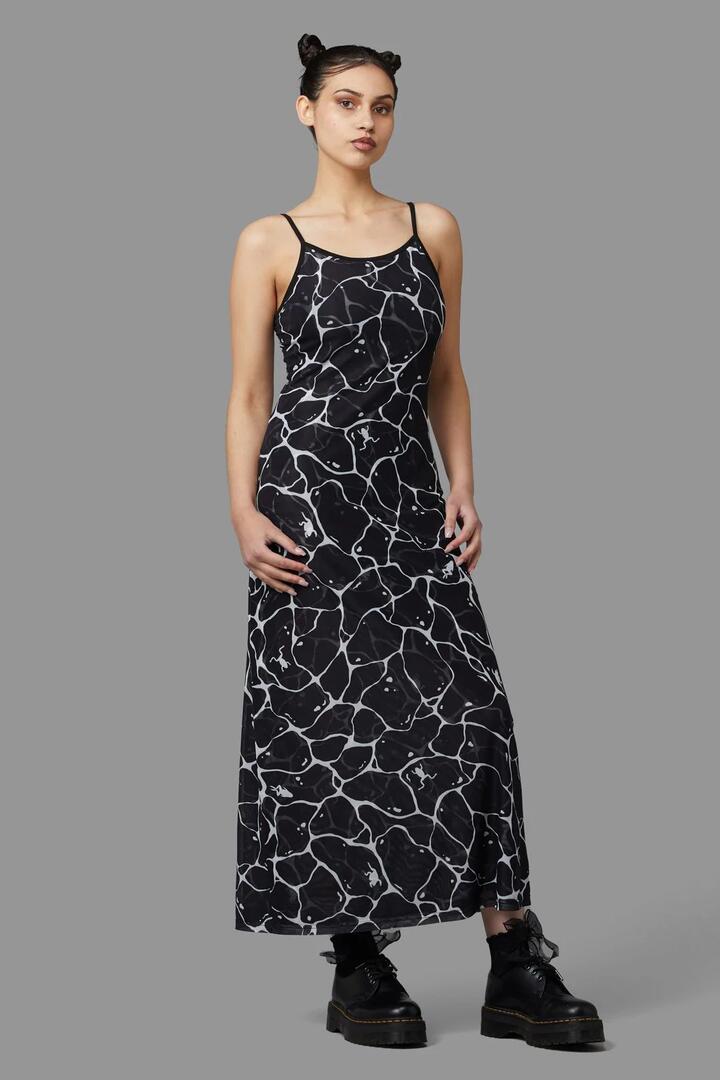 Image of a model wearing Dress. Productname: Lily Pad Dress in Black colour by brand - Black Friday