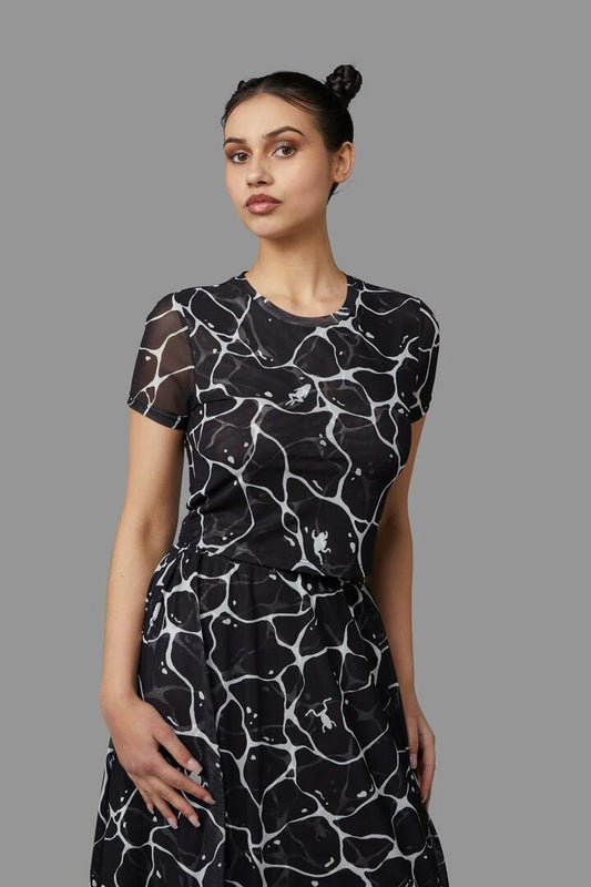 Image of a model wearing Tops. Productname: Lily Pad Top in Black colour by brand - Black Friday