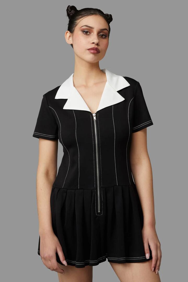 Image of a model wearing Dress. Productname: Mercy Dress in Black/White colour by brand - Black Friday
