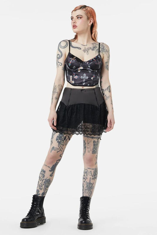 Image of a model wearing Skirts. Productname: Boudoir Satin Lace Skort in Black colour by brand - Dangerfield