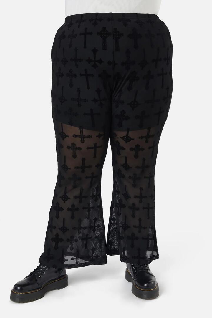 Image of a model wearing Pants. Productname: Vowed Flocked Mesh Pant in Black colour by brand - Dangerfield