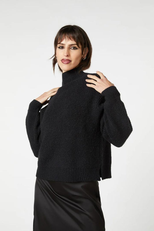 Image of a model wearing Outerwear. Productname: Time & Date Fluffy Jumper in Black colour by brand - Dangerfield
