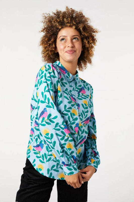 Image of a model wearing Tops. Productname: Pink Robin Blouse in Blue colour by brand - Princess Highway