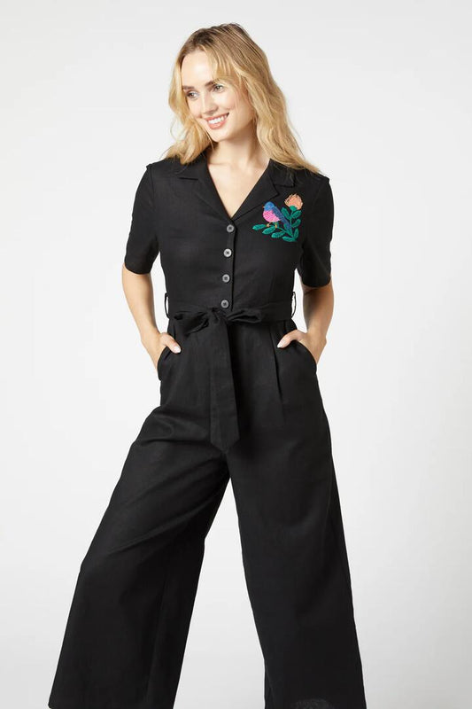 Image of a model wearing Outerwear. Productname: Pink Robin Jumpsuit in Black colour by brand - Princess Highway