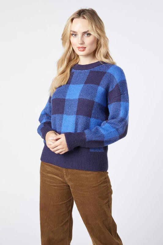 Image of a model wearing Outerwear. Productname: Ivy Check Jumper in Navy colour by brand - Princess Highway