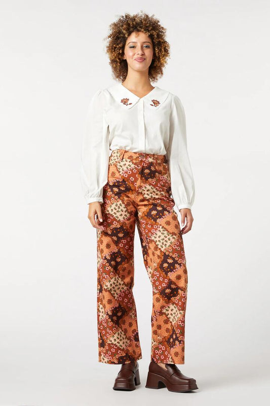 Image of a model wearing Denim. Productname: Patchwork Flower Jean in Chocolate colour by brand - Princess Highway