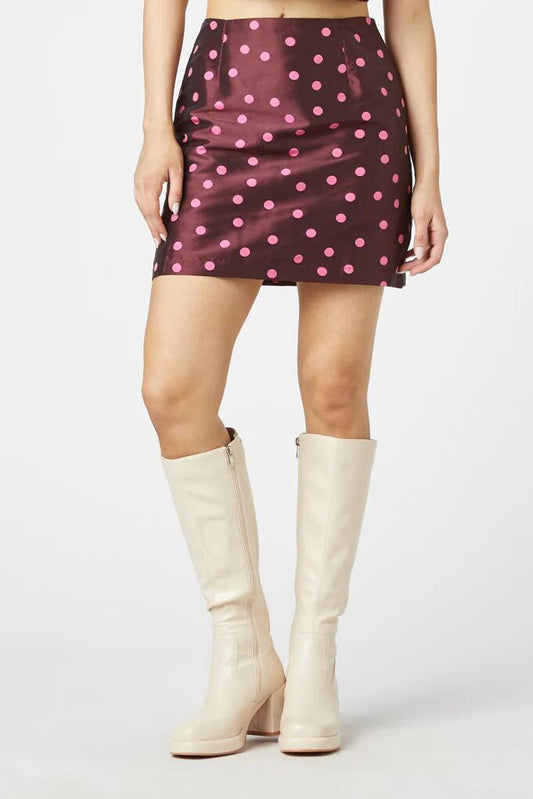 Image of a model wearing Skirts. Productname: Bonnie Spot Skirt in Berry colour by brand - Princess Highway