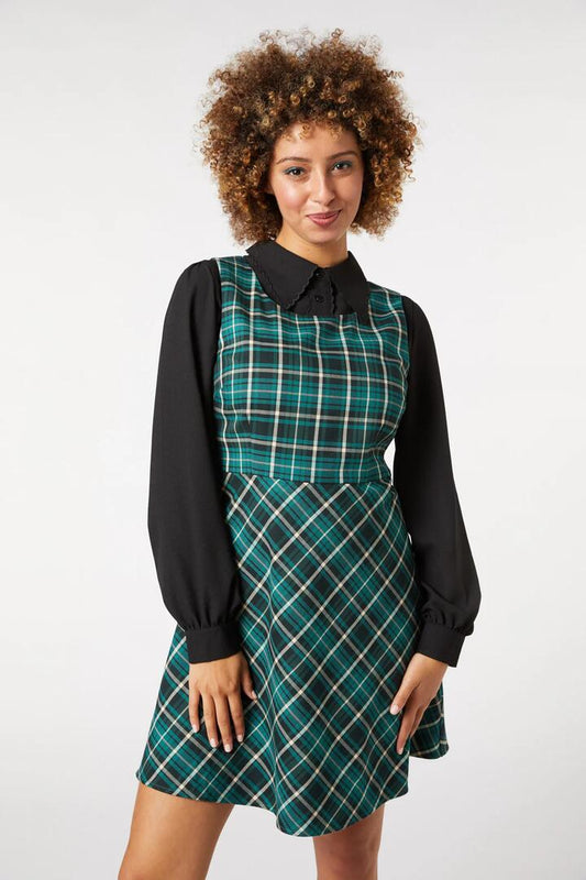 Image of a model wearing Dress. Productname: Amber Check Pinny in Teal colour by brand - Princess Highway