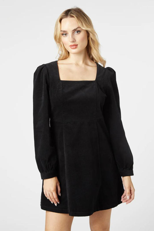 Image of a model wearing Dress. Productname: Arianna Cord Dress in Black colour by brand - Princess Highway