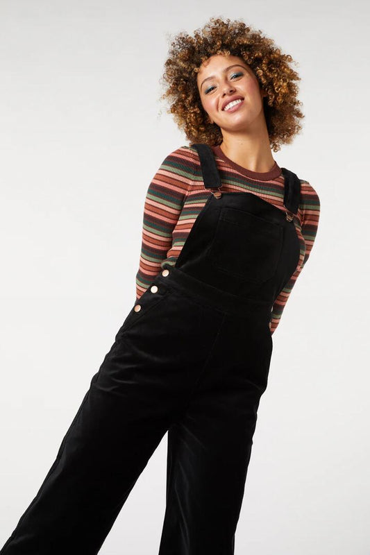 Image of a model wearing Pants. Productname: Sadie Velvet Overall in Black colour by brand - Princess Highway