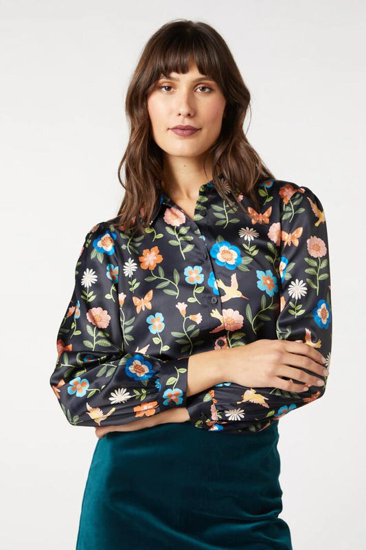 Image of a model wearing Tops. Productname: Hummingbird Blouse in Navy colour by brand - Princess Highway