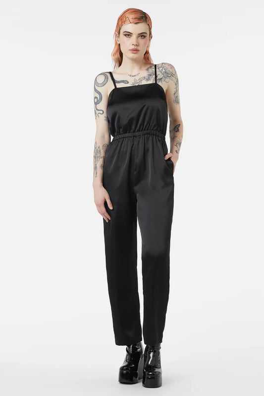 Image of a model wearing Outerwear. Productname: Vicious Jumpsuit in Black colour by brand - Dangerfield