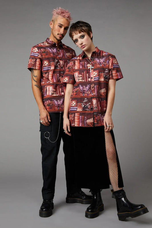 Image of a model wearing Shorts. Productname: Bookish Print Short Sleeve Shirt in Multi colour by brand - Black Friday