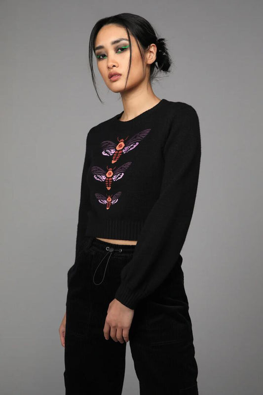 Image of a model wearing Tops. Productname: Moth Knit in Black colour by brand - Black Friday