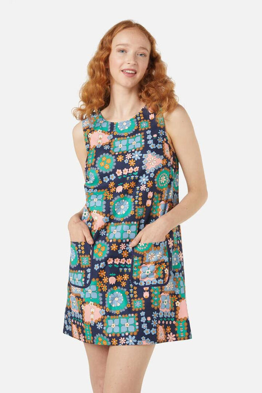 Image of a model wearing Dress. Productname: Sunny Retro Shift Dress in Cream colour by brand - Princess Highway