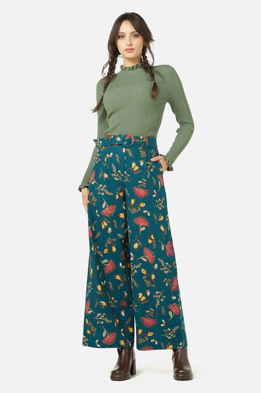 Image of a model wearing Pants. Productname: NZ Flora Pant in Teal colour by brand - Princess Highway