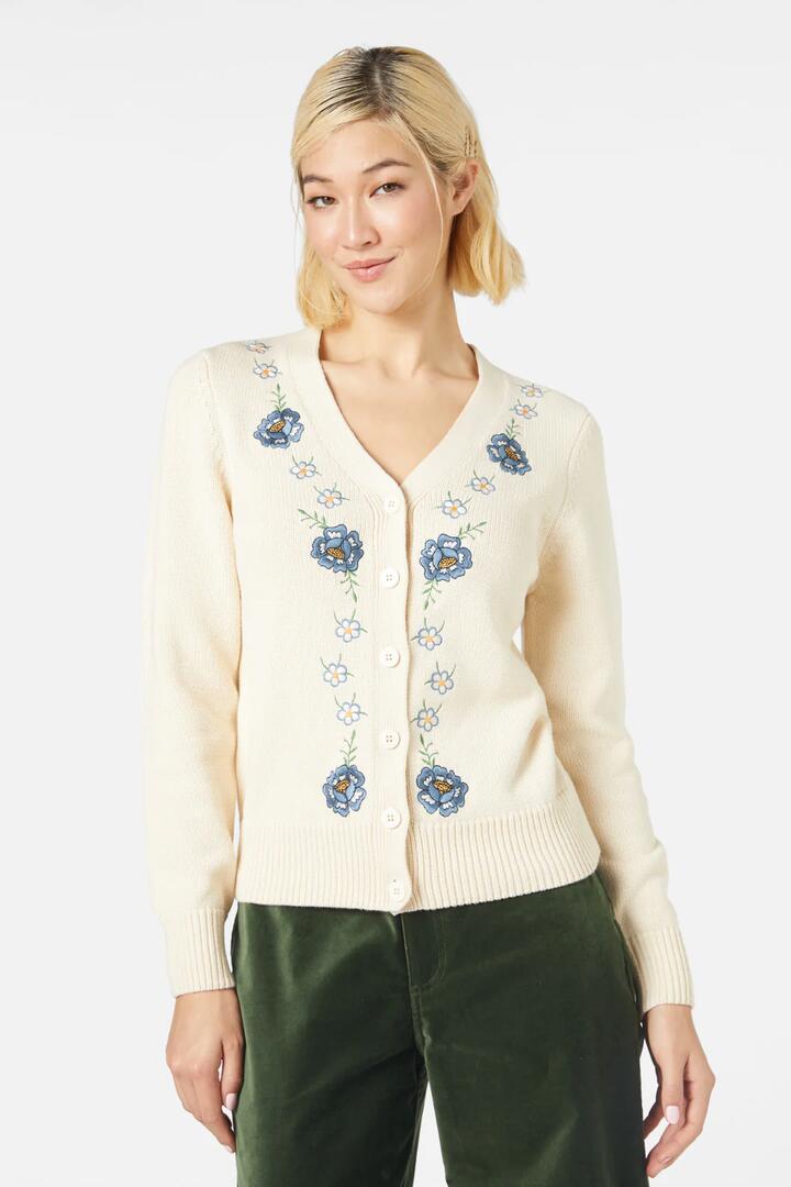 Image of a model wearing Outerwear. Productname: Agnes Emb Cardi in Cream colour by brand - Princess Highway