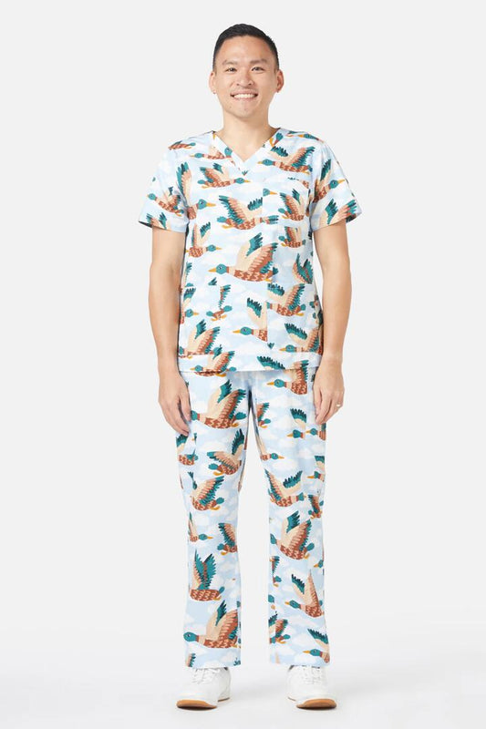 Image of a model wearing Uniforms & Workwear. Productname: Flying Duck Scrub Set in Blue colour by brand - Scrubs With Love