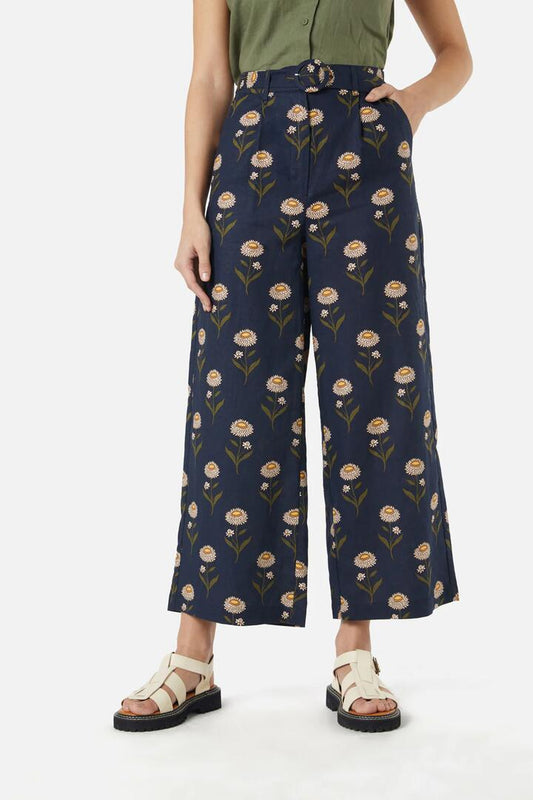 Image of a model wearing Pants. Productname: Strawflower Pant in Navy colour by brand - Princess Highway