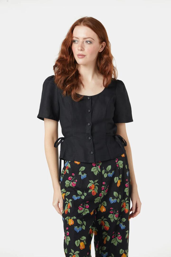 Image of a model wearing Tops. Productname: Carly Top in Black colour by brand - Princess Highway
