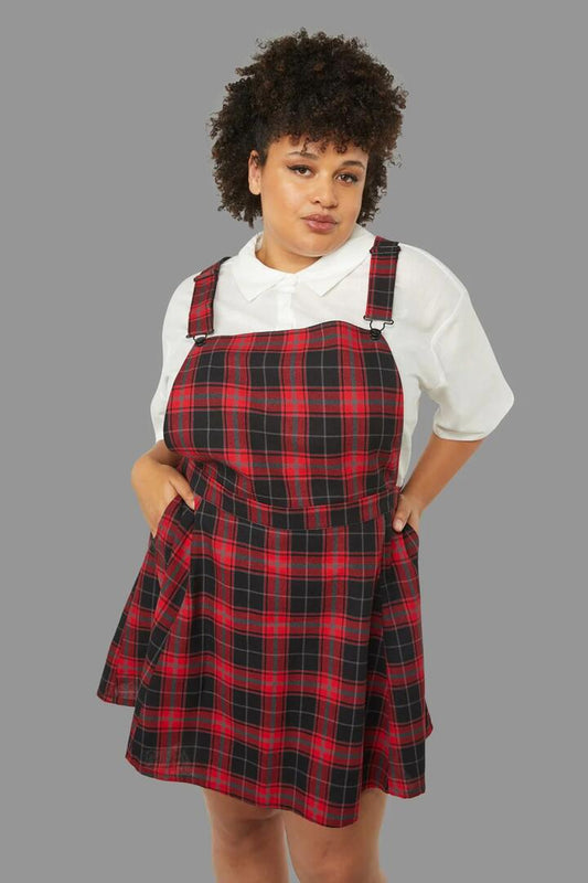 Image of a model wearing Dress. Productname: Curve Life On Mars Pinafore in Red colour by brand - Black Friday
