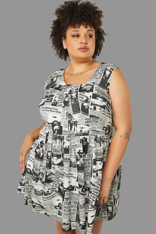 Image of a model wearing Dress. Productname: Curve Extraterrestrial Dress in Cream colour by brand - Black Friday
