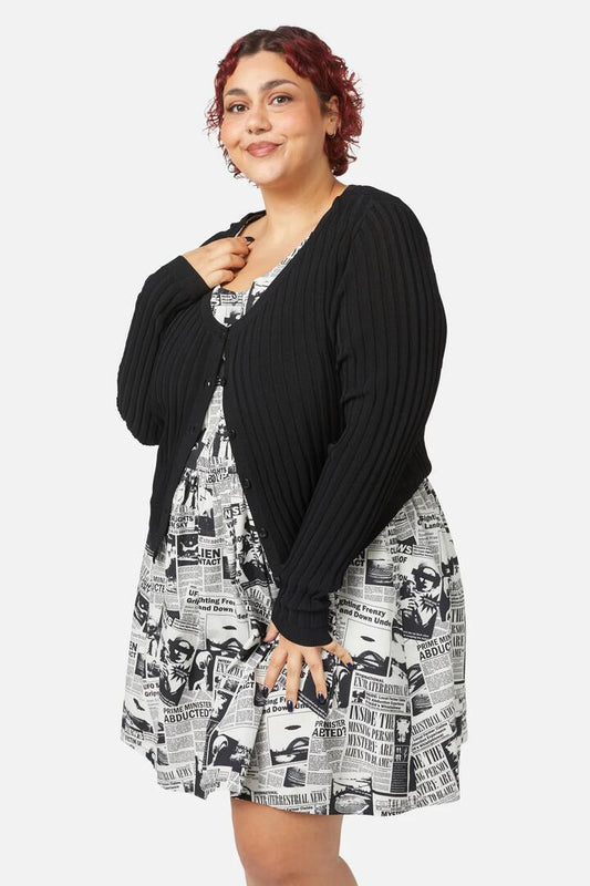 Image of a model wearing Outerwear. Productname: Curve Voyager Cardigan in Black colour by brand - Black Friday