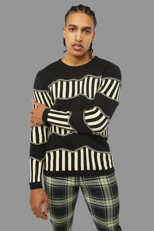 Image of a model wearing Tops. Productname: Caution Knit in White/Black colour by brand - Black Friday