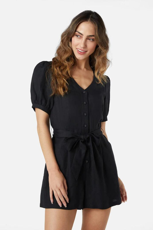 Image of a model wearing Dress. Productname: Bianca Playsuit in Black colour by brand - Princess Highway