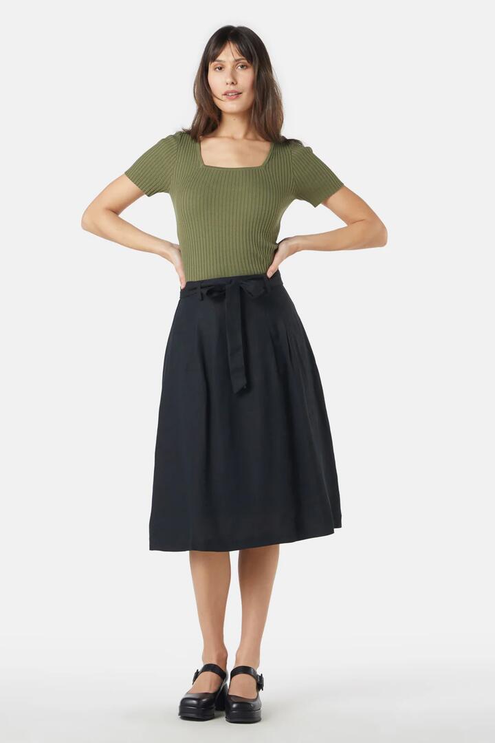 Image of a model wearing Skirts. Productname: Elke Skirt in Black colour by brand - Princess Highway