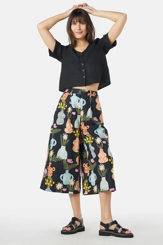 Image of a model wearing Skirts. Productname: Pretty Vases Skort in Black colour by brand - Princess Highway