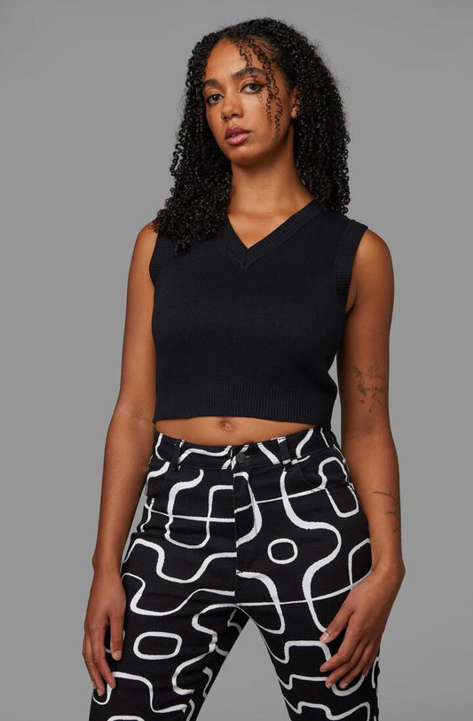 Image of a model wearing Tops. Productname: Haunted Bloom Knit Vest in Black colour by brand - Black Friday
