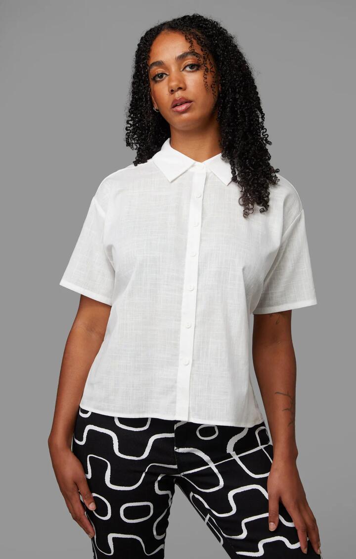 Image of a model wearing Tops. Productname: Soundwave Blouse in White colour by brand - Black Friday