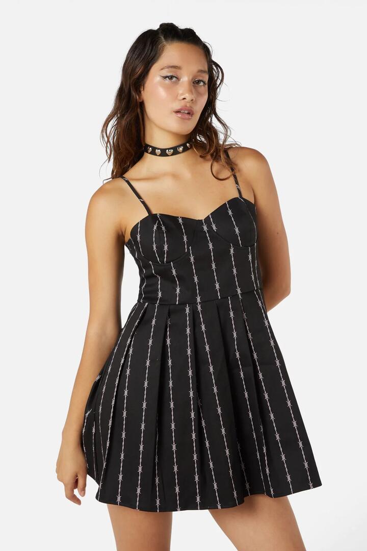 Image of a model wearing Dress. Productname: Barb Wire Bustier Pleated Dress in Black colour by brand - Dangerfield
