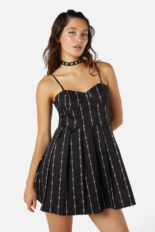 Image of a model wearing Dress. Productname: Barb Wire Bustier Pleated Dress in Black colour by brand - Dangerfield
