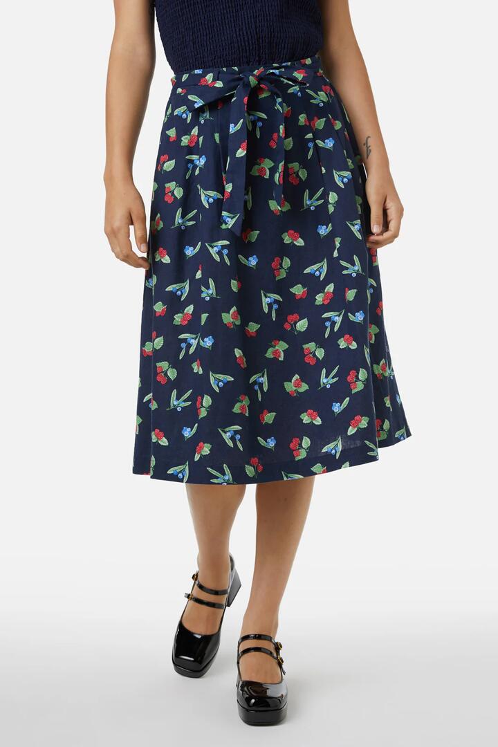 Image of a model wearing Skirts. Productname: Berry Skirt in Navy colour by brand - Princess Highway