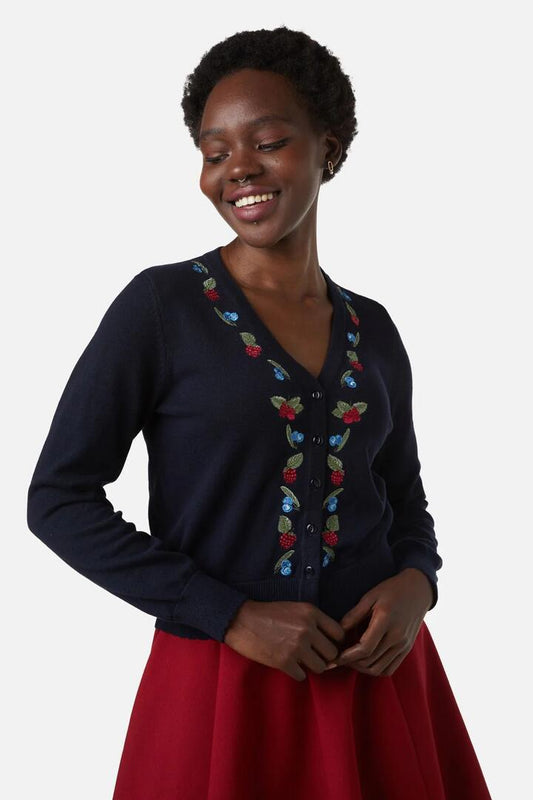 Image of a model wearing Outerwear. Productname: Berry Sweet Emb Cardi in Navy colour by brand - Princess Highway